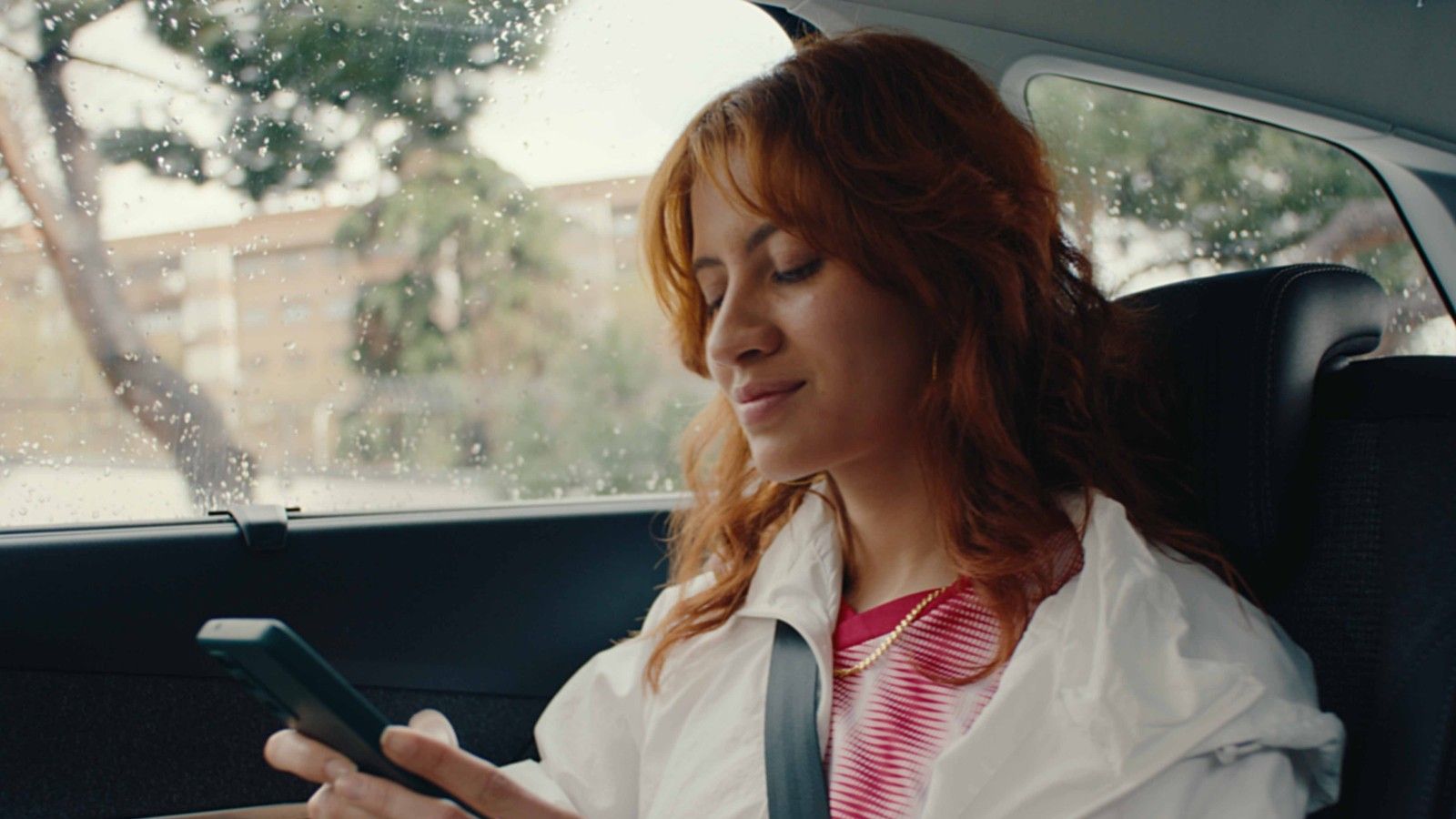 woman looking at mobile
